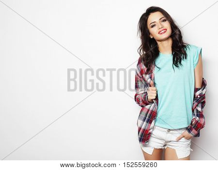 beautiful woman wearing casual clothes, posing on white backgrou