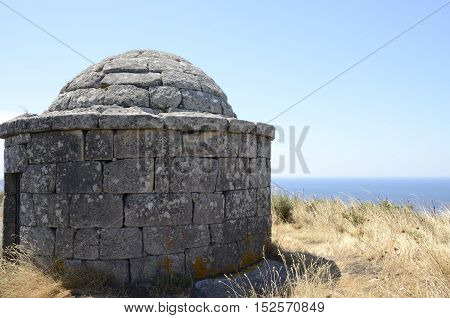 Reconstructed of prehistorical house at the Mountain of Facho in Cangas in the province of Pontevedra Galicia Spain.