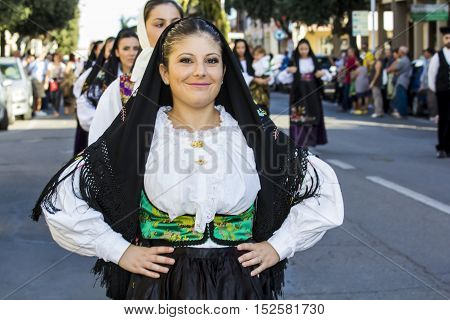 QUARTU S.E., ITALY - September 17, 2016: Parade of Sardinian costumes and floats for the grape festival in honor of the celebration of St. Helena. - Sardinia