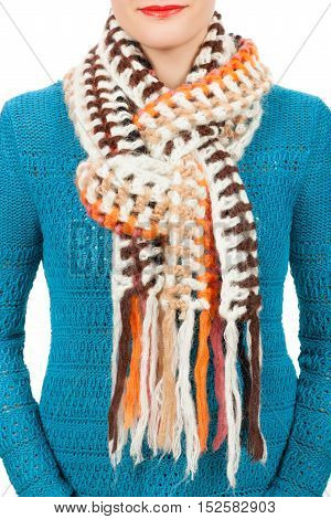 Woolen scarf. Beige woolen scarf around her neck isolated on white background. Female accessory.