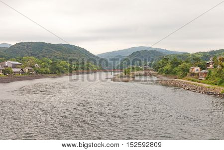 View of Uji River from Uji Bridge. Uji River was a scene for many Japanese legends and tales including Tale of Heike (14th c.) and Tale of Genji (11th c.)
