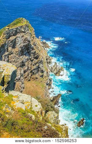 Cape Point is a promontory at the southeast corner of the Cape Peninsula and is part of Table Mountain National Park, within at section called Cape of Good Hope in South Africa.