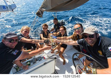HYDRA, GREECE - SEP 28, 2016: Sailors participate in sailing regatta 16th Ellada Autumn 2016 among Greek island group in the Aegean Sea, in Cyclades and Saronic Gulf.