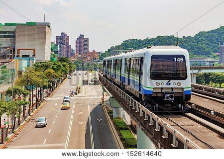 TAIPEI TAIWAN - JULY 09: This is the taipei mrt in new taipei city which has an overground line and goes through the rural areas of Taipei on July 09th 2014 in Taipei
