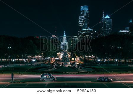 night time shot in Philadelphia from the Rocky steps at the art museum of the benjamin franklin parkway