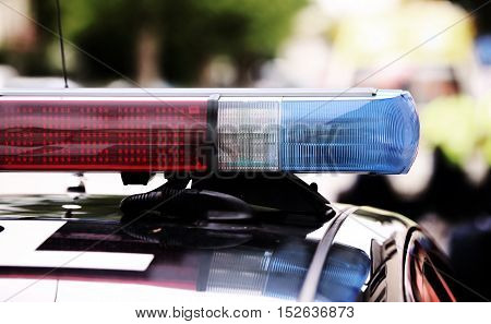 Red And Blue Flashing Lights Of The Police Car At The Checkpoint
