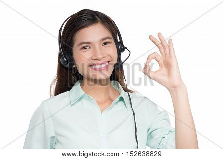 Portrait of happy smiling asian woamn support phone operator in headset