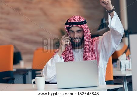 Arabian Businessman Working In Modern Startup Office