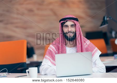 Arabian Businessman Working In Modern Startup Office