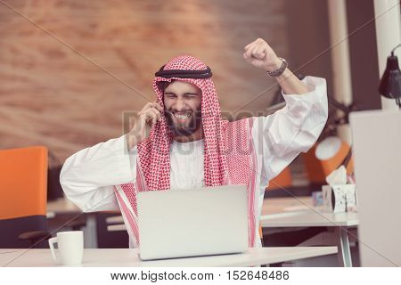 Arabian Businessman Working In Modern Startup Office