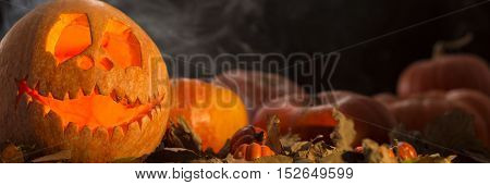 Halloween Pumpins With The Smoke Around Them