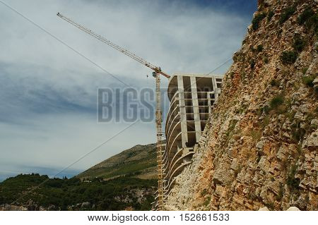 Construction Of The Hotel In The Rock By The Sea