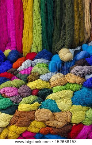 Different colour sheep wool yarns at market