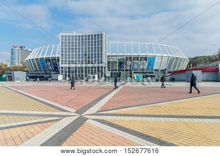 Kyiv Ukraine - October 20 2016: Pedestrians in front of the Olympic Stadium (NSC Olimpiysky) in Kyiv Ukraine.