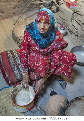 Omani Woman Smiling For A Camera