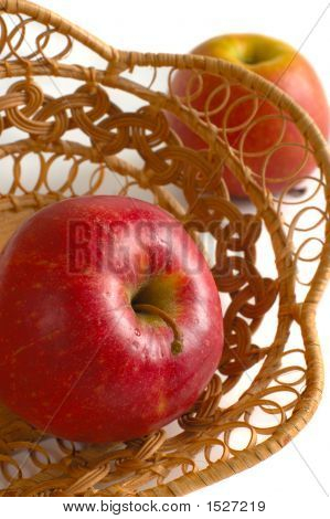 Apple In A Crib On The White Background