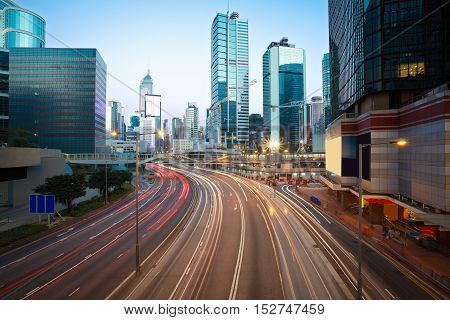 Road Light Trails On Streetscape Buildings In Hongkong