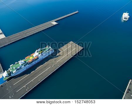 Zadar, Croatia - July 20, 2016: Aerial view of Jadrolinija ferry boats in Gazenica port in Zadar, Croatia. Car ferry boats linking the islands to mainland
