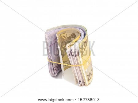 Euro banknotes under rubber band isolated on white
