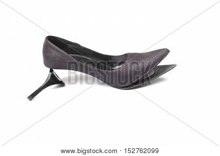 worn out high heel shoe isolated on white background