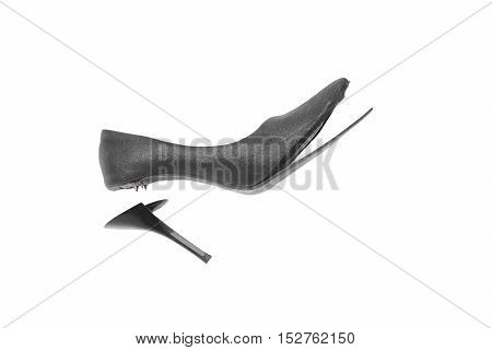 worn out high heel shoe isolated on white background