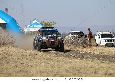 Speeding Black Ford Ranger Rally Car At Start Of Race