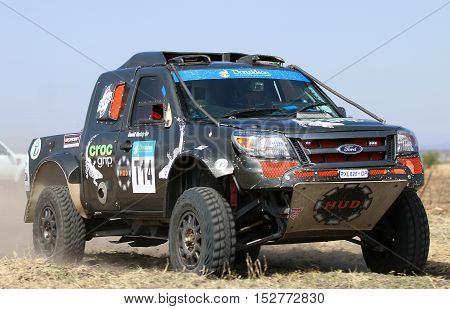 Forty Five Degree Close-up View Of Speeding Black Ford Ranger Rally Car