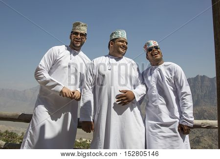 Wakan village Oman October 15th 2016: Three omani guys in mountains