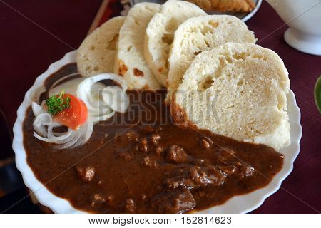 Gourmet Venison goulash with bread dumplings and onion