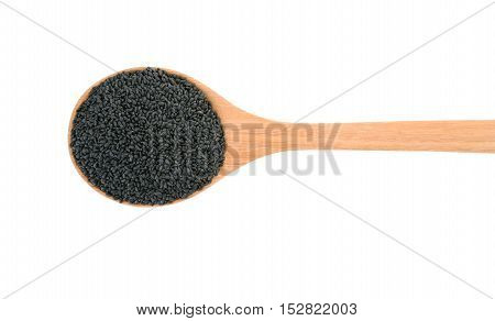 top view of black sesame seeds in wooden spoon isolated on white