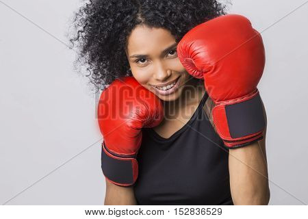 Close Up Of Cheerful Woman In Fight Stand With Red Boxing Gloves