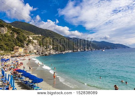 MONTEROSSO AL MARE, ITALY - SEPTEMBER 20, 2016: Unidentified people at Monterosso al mare in Italy. It is one of the five towns that make up the Cinque Terre region