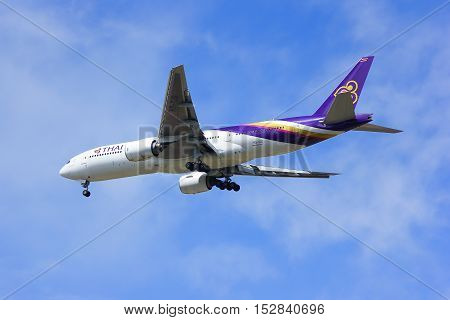 CHIANGMAI, THAILAND- JULY 10 2014 :Boeing 777-200ER HS-TJS of Thaiairway. landing to Chiangmai airport from Bangkok Suvarnabhumi, thailand.