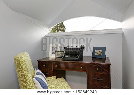 Small Home Office Area With Retro Typing Machine.