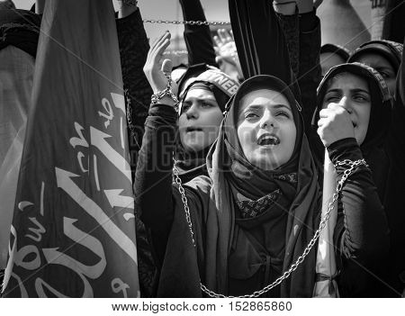 Istanbul Turkey - October 11 2016: Muslims worldwide marks Ashura Istanbul Shiite community. Turkish Shia Muslims mourning for Imam Hussain. Caferis take part in a mourning procession marking the day of Ashura in Istanbul's Kucukcekmece district Turkey on