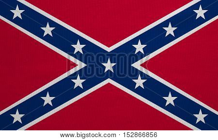 Historical national flag of the Confederate States of America. Known as Confederate Battle Rebel Southern Cross Dixie flag. Patriotic symbol banner. Flag of the CSA fabric texture illustration