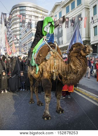 Istanbul Turkey - October 11 2016: Muslims worldwide marks Ashura Istanbul Shiite community. Turkish Shia Muslims mourning for Imam Hussain. Caferis take part in a mourning procession marking the day of Ashura in Istanbul's Kucukcekmece district Turkey on