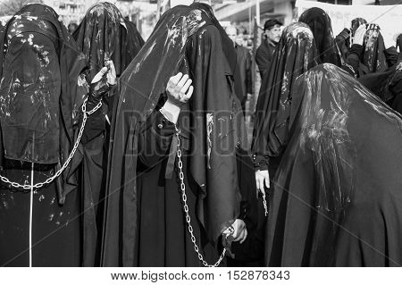Istanbul Turkey - October 11 2016: Muslims worldwide marks Ashura Istanbul Shiite community. Turkish Shia Muslims mourning for Imam Hussain. Caferis take part in a mourning procession marking the day of Ashura in Istanbul's Kucukcekmece district Turkey on
