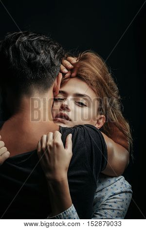 Pretty Girl Embraces Man