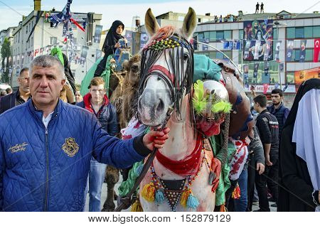 Istanbul Turkey - October 11 2016: Muslims worldwide marks Ashura Istanbul Shiite community. Turkish Shia Muslims mourning for Imam Hussain. Caferis take part in a mourning procession marking the day of Ashura in Istanbul's Kucukcekmece district Turkey on