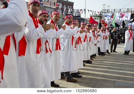 Istanbul Turkey - October 11 2016: Muslims worldwide marks Ashura Istanbul Shiite community. Turkish Shia Muslims mourning for Imam Hussain. Caferis take part in a mourning procession marking the day of Ashura in Istanbul's Kucukcekmece district Turkey on