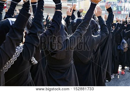 Istanbul Turkey - October 11 2016: Muslims worldwide marks Ashura Istanbul Shiite community. Turkish Shia Muslims mourning for Imam Hussain. Caferis take part in a mourning procession marking the day of Ashura in Istanbul's Kucukcekmece district Turkey on