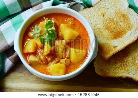 Chicken Mussaman Curry  (Thai food menu) with toast.