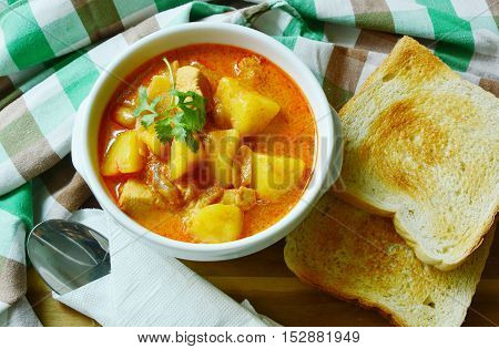 Chicken Mussaman Curry  (Thai food menu) with toast.