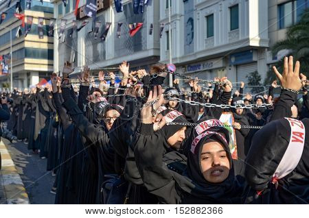 Istanbul Turkey - October 11 2016: Muslims worldwide marks Ashura Istanbul Shiite community. Turkish Shia Muslims mourning for Imam Hussain. Caferis take part in a mourning procession marking the day of Ashura in Istanbul's Kucukcekmece district Turkey on