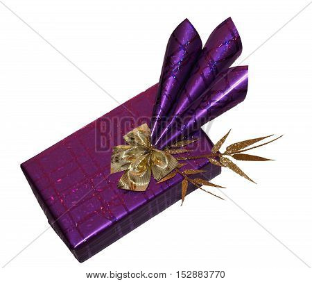Luxury wrapping gift with gold bow and leaves