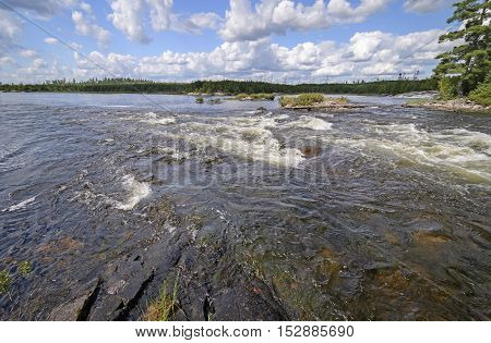 Raging Rapids in the Wilderness of the Falls Chain in Quetico Provincial Park in Ontario