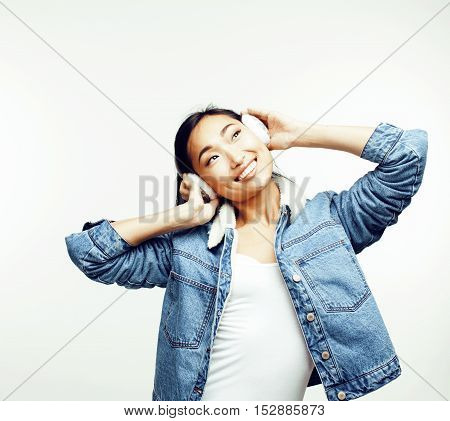 young pretty asian modern fashion hister woman in winter earphones posing cheerful emotional isolated on white background, lifestyle people concept close up