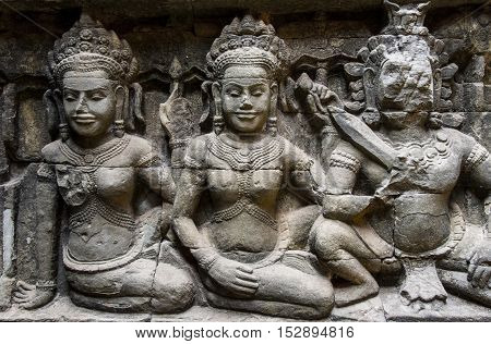 Apsara carvings status on the wall of Angkor temple world heritage