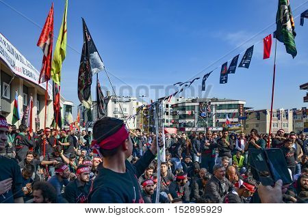 Istanbul Turkey - October 11 2016: Muslims worldwide marks Ashura Istanbul Shiite community. Turkish Shia Muslims mourning for Imam Hussain. Caferis take part in a mourning procession marking the day of Ashura in Istanbul's Kucukcekmece district Turkey
